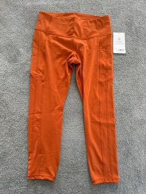 NWT Athleta Orange High-Rise Performance Leggings with Side Pockets